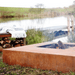 Corten Steel Flama Fire Table by river
