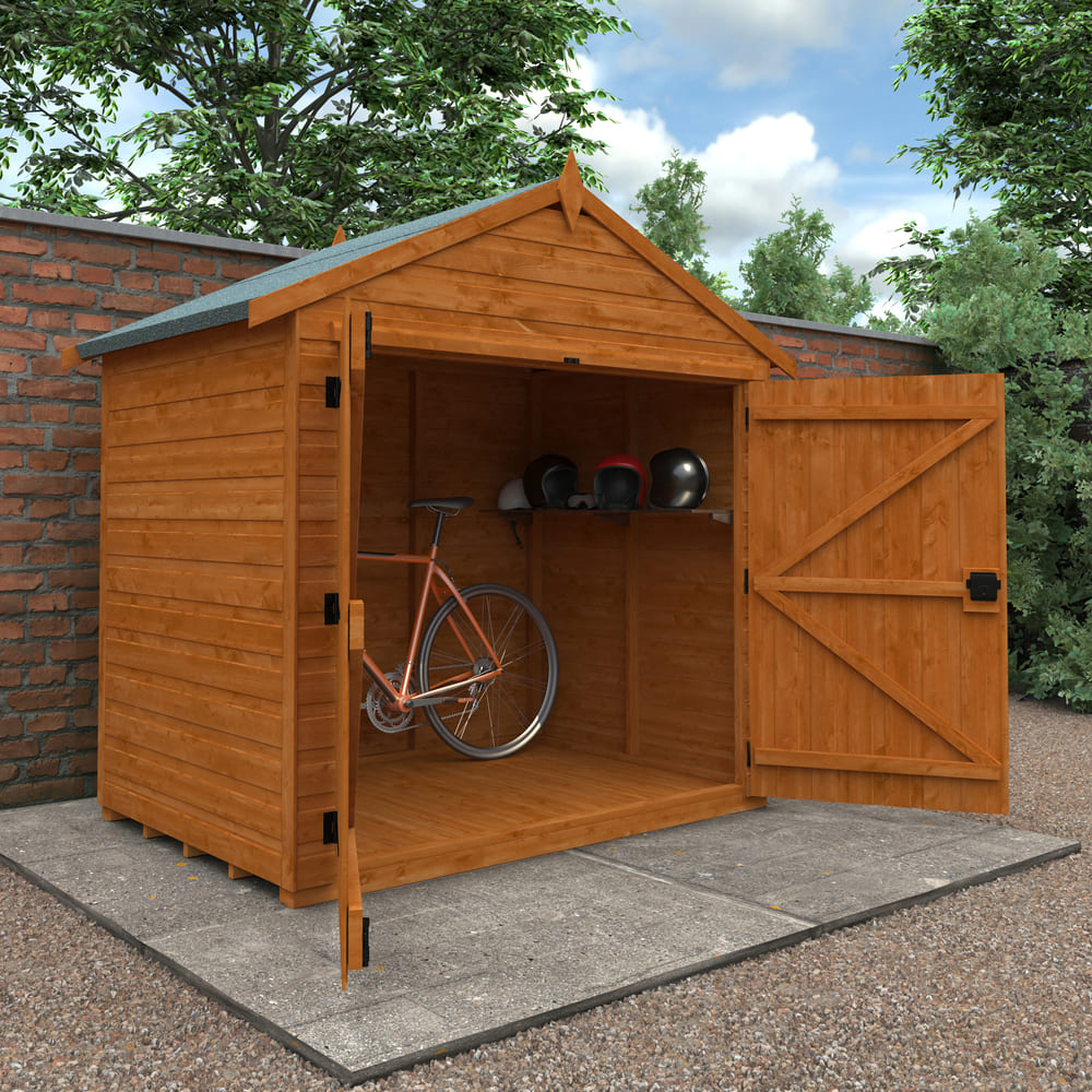Wooden shed with an open door revealing a bicycle inside, set against a natural background.