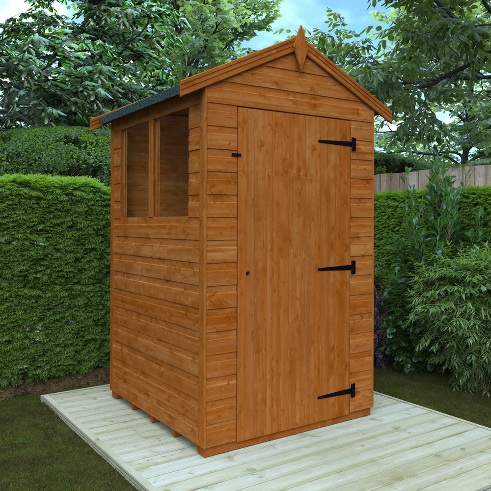 Wooden shed with a gabled roof in a garden setting