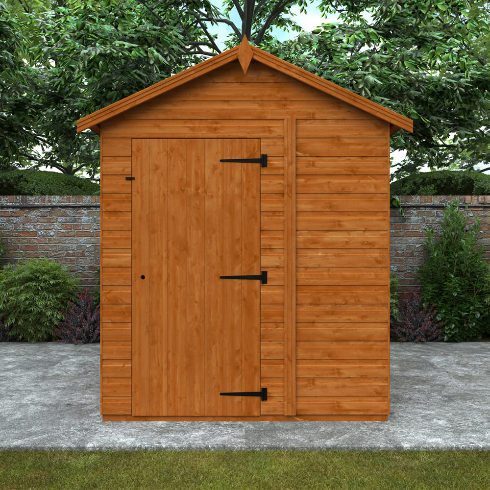 Wooden shed with a gabled roof in a garden setting