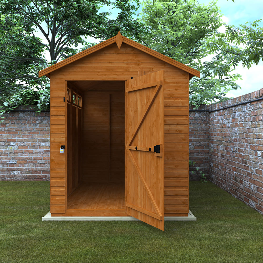 Wooden shed with open door in a garden setting