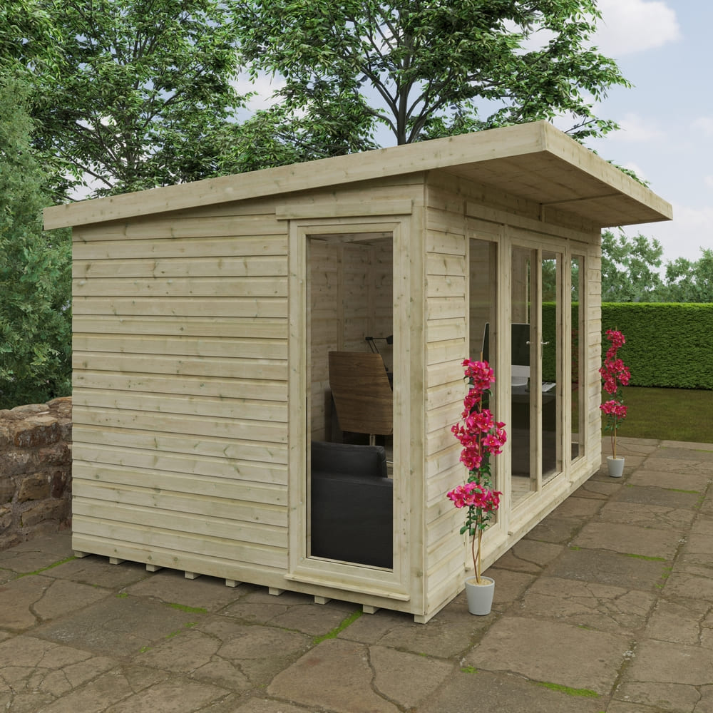 Wooden garden shed with patio furniture and flowers on a stone patio