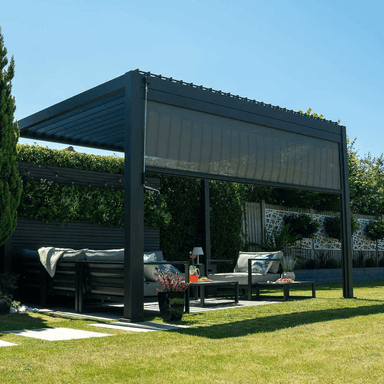 Outdoor patio area with a pergola and outdoor furniture on a sunny day.