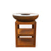 HEAT Bakka rust plancha grill on its log storage stand