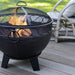 Close-up of the HEAT Boble fire bowl with its spark screen and handle