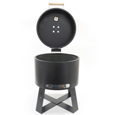 HEAT Braten charcoal BBQ with lid open, on a white background