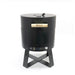 HEAT Braten compact charcoal BBQ with lid closed, on a white background
