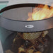 Close-up of flames inside the HEAT Fire Drum perforated steel basket