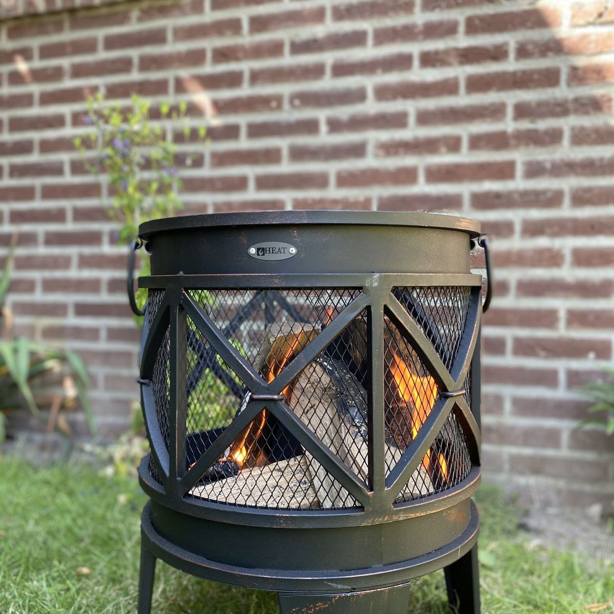 Close-up of a fire burning inside the HEAT FireCask barrel