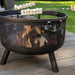 Marshmallows toasting over the HEAT Hornset fire pit on garden decking