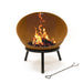 HEAT Kappa rust fire pit with a fire burning in the open bowl