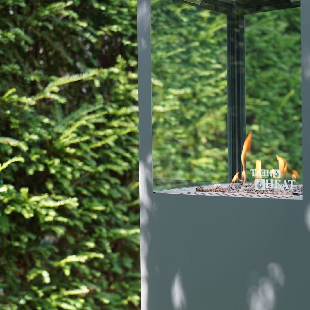 HEAT Utevarme glass flame tower, angled close view