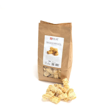 HEAT Woodwool 1kg bag with woodwool firelighters in front