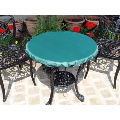 Round table top cover green on table